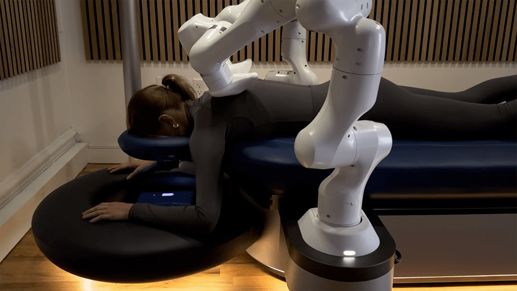 Robotic massage therapy session at NYC spa for relaxation and pain relief