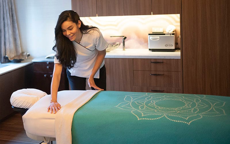 ILA Spa Midtown Therapist Preparing Treatment Room NYC