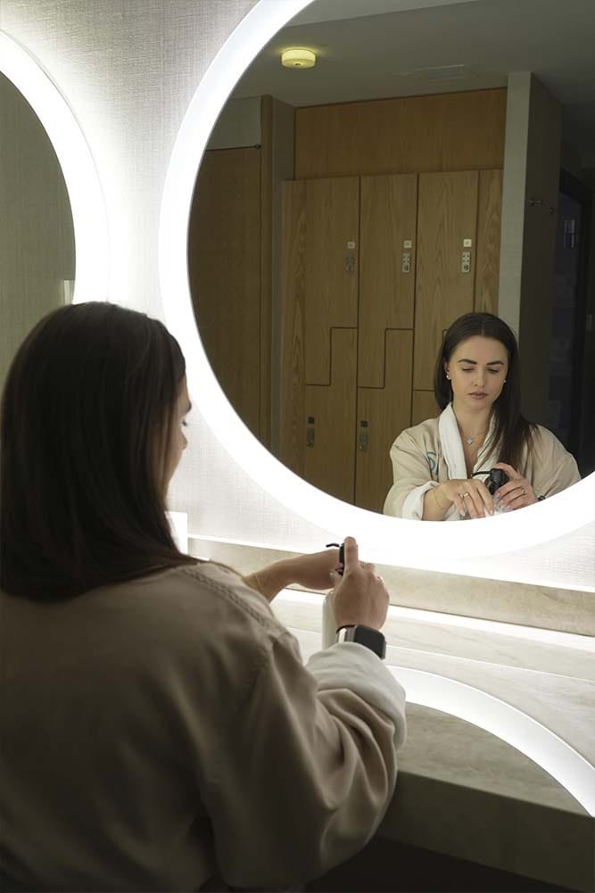 Spa guest preparing in the locker room at ila Only Spa day spa on Madison Avenue in Midtown Manhattan NYC