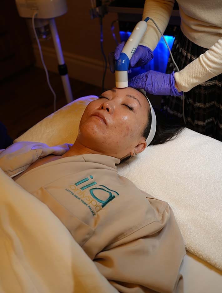 HydraFacial treatment using advanced skincare device at ila Only Spa in Midtown Manhattan New York