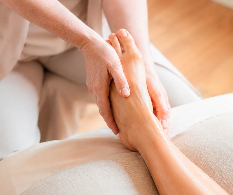 Guest receiving a professional foot massage at ila Only Spa in New York City