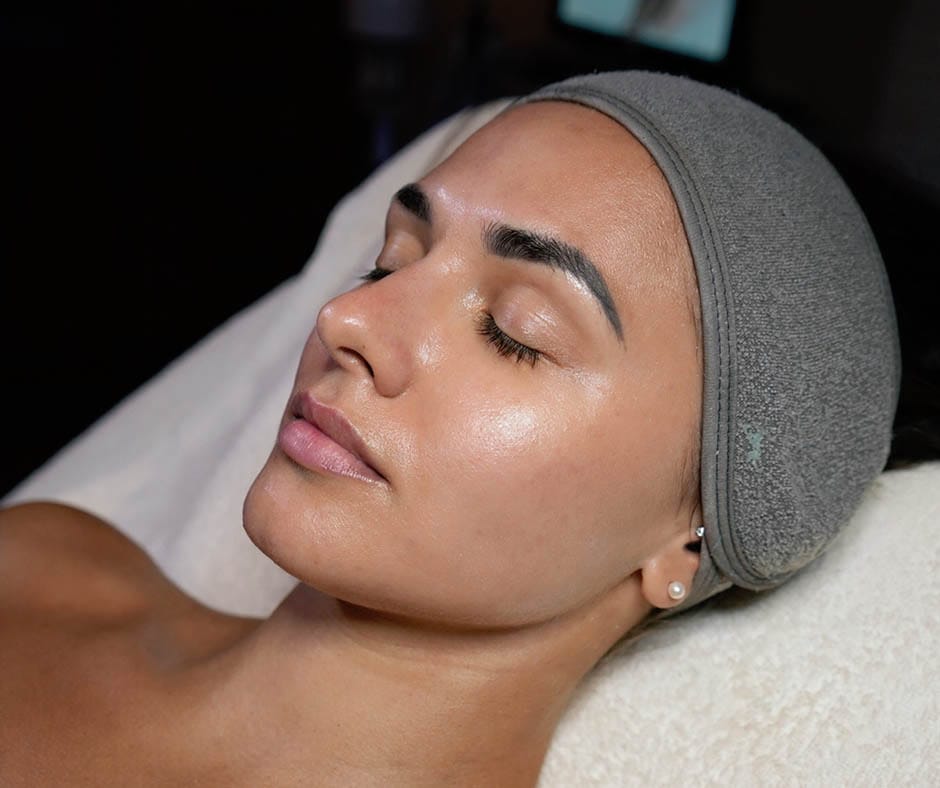 Guest with refreshed, hydrated-looking skin after a professional facial at ila Only Spa in Manhattan