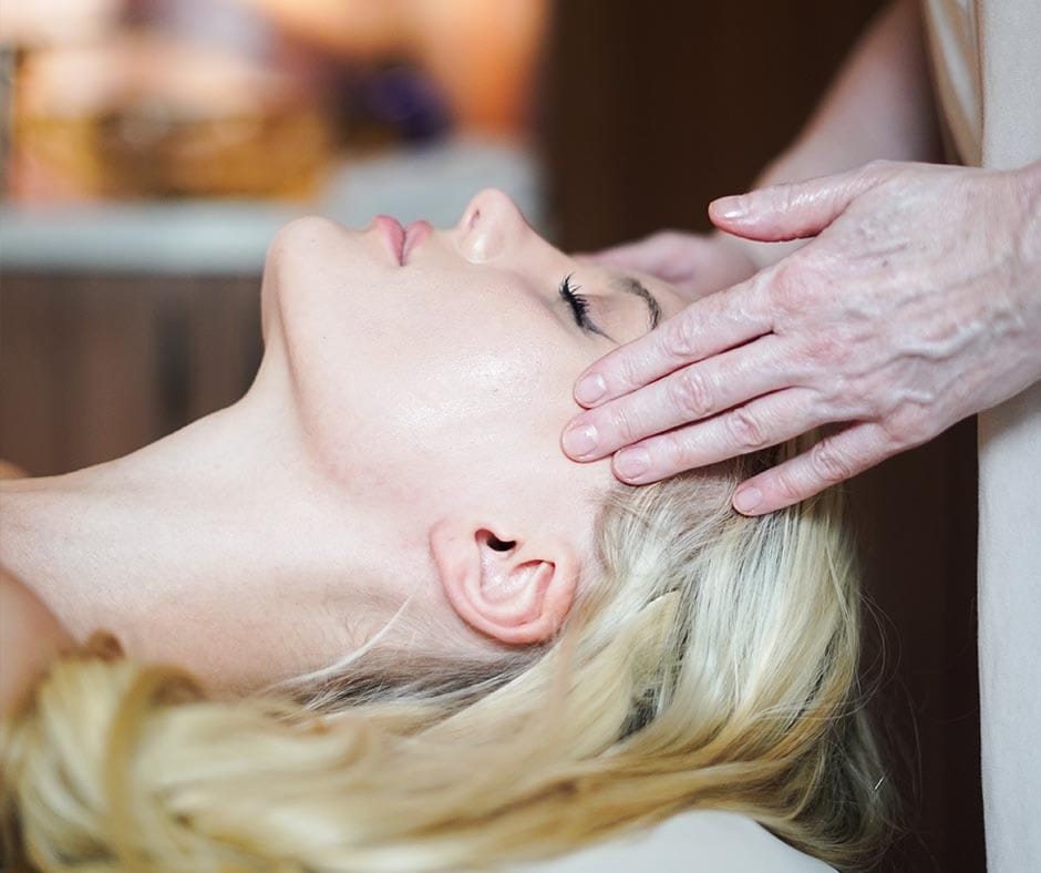 Guest receiving a relaxing spa massage at ila Only Spa in New York City