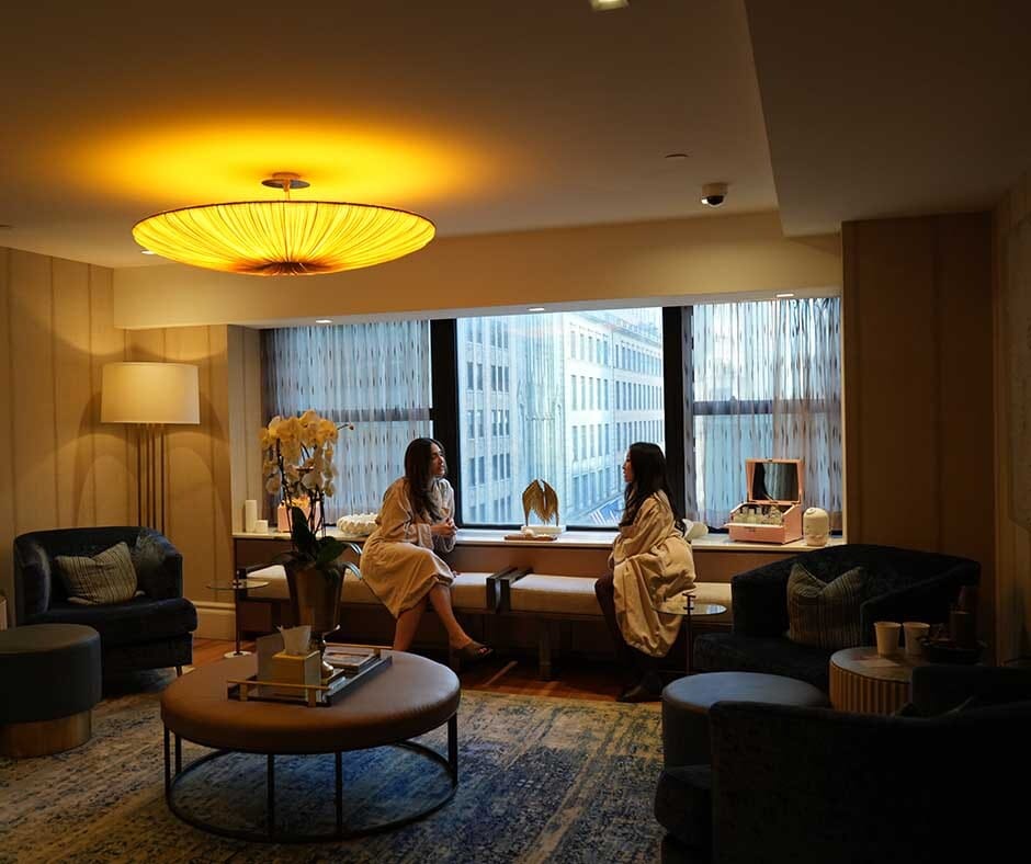 Guest discussing ongoing skincare and spa treatments with an ila Only Spa professional in NYC
