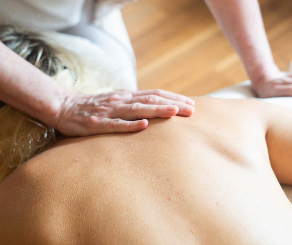 Therapeutic massage treatment for muscle tension and relaxation at ila Only Spa in NYC
